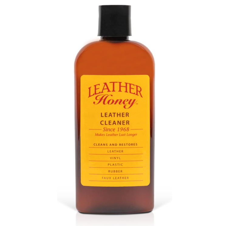 Botella de limpiador Leather Honey para cuero, vinilo y plástico, desde 1968.